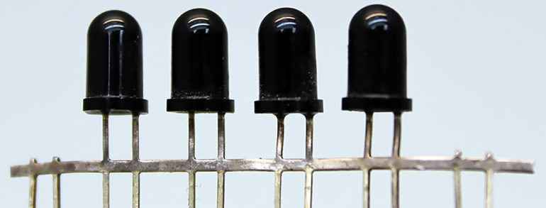 INFRARED LASER ENCAPSULANTS